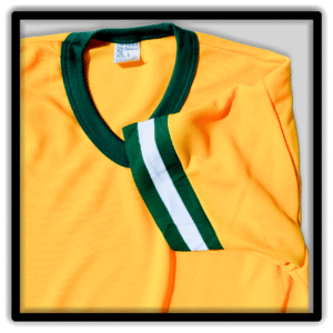 Folded yellow ringer T-shirt showing its green V-neck and green-and-white sleeve bands.