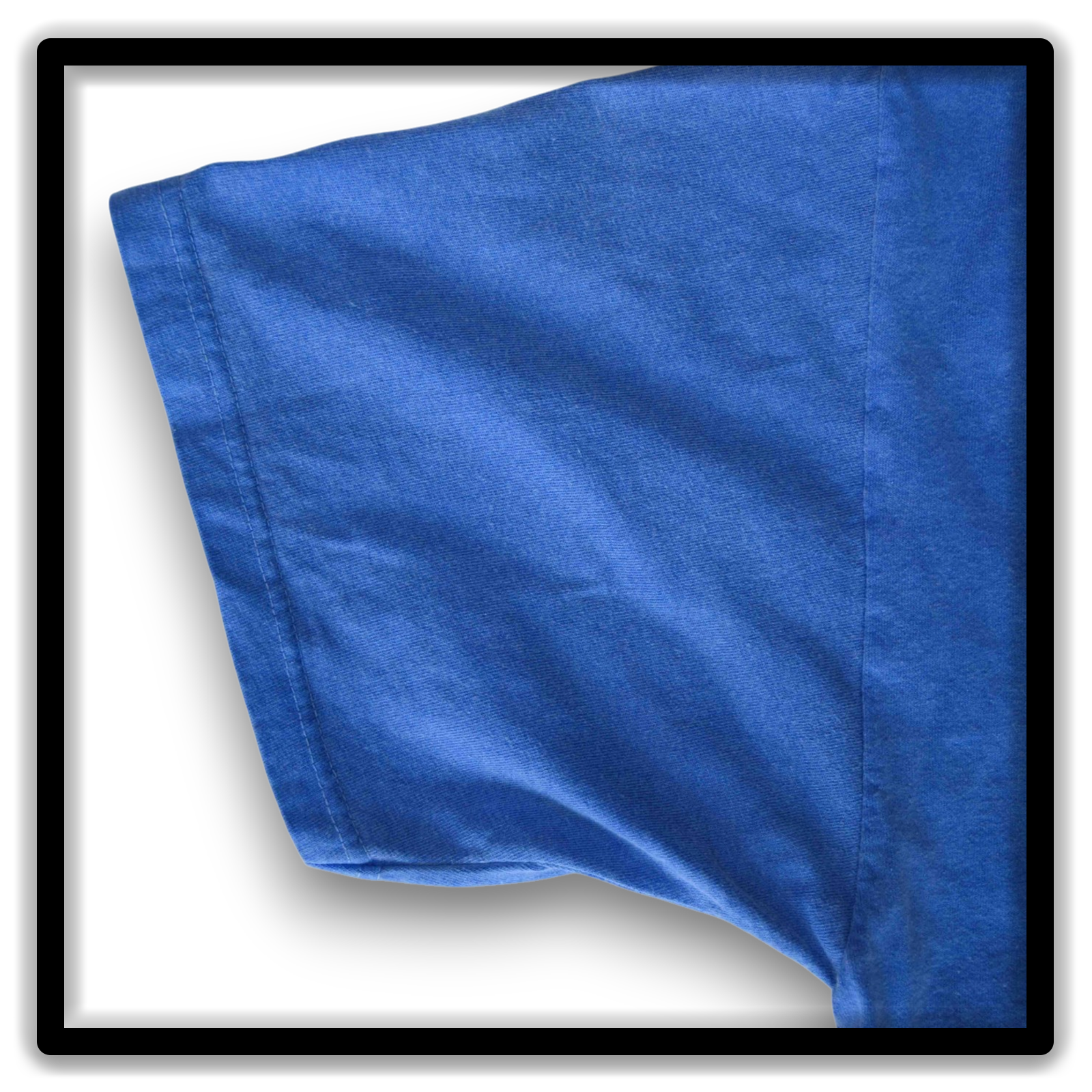 Sleeve Detail on a vintage blue double-stitch blank T-shirt, size XL, from the Printer's Dozen